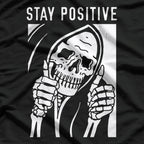 Stay Positive… Or Else: Skeleton Humor T-Shirt
